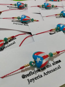 Pulseras "Mi Bandera", en hilo rojo.